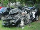 car crash mangled black car 800x600