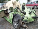 car crash mangled green car 800x600