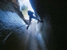 man absailing down ravine from below 800x600