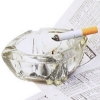ashtray on newspaper with cig
