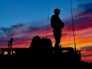 soldier on guard at sunset 1024x768