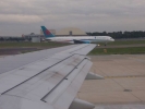 4 flying tk window view take off 08 takeoff wing with terminal buildings 5