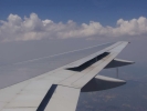 5 flying tk window view inflight clouds 1