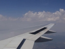 5 flying tk window view inflight clouds 2