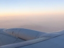 5 flying tk window view inflight haze 4 and blue sky