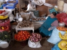 market woman selling fruit and veg at market p1020009 b