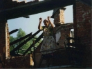 people woman in rubble of house 1