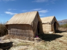 therapy reed huts on lake bank p1000799 b